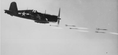 F4U launching rockets at ground targets at Okinawa.  From http://www.archives.gov/research/ww2/photos/images/ww2-157.jpg